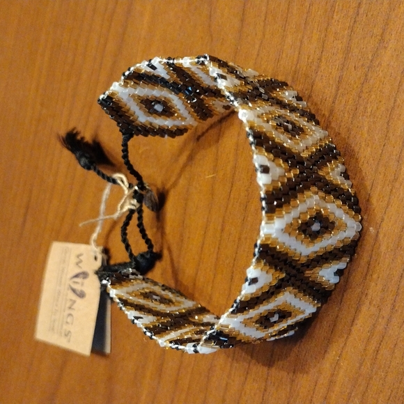 Alexa's Angels pull string Clasp bracelet. - Picture 2 of 9